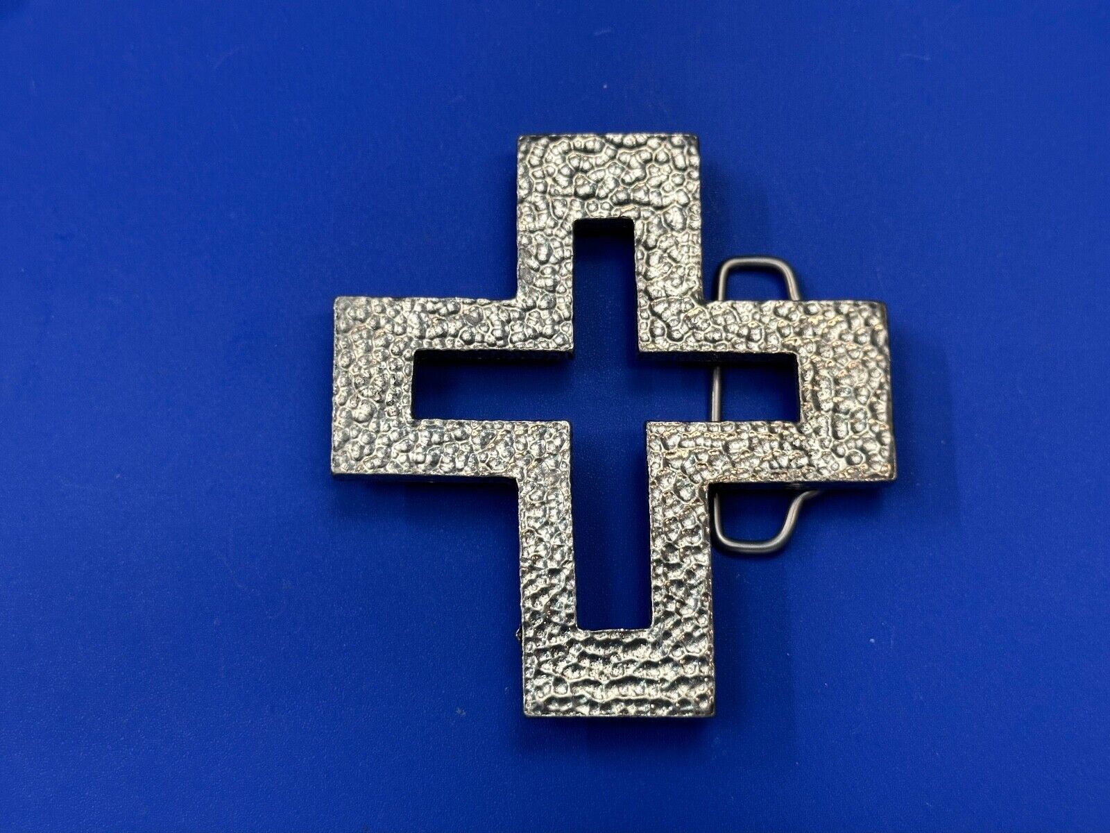 A.P.W. 2007 cross cutout silver tone belt buckle