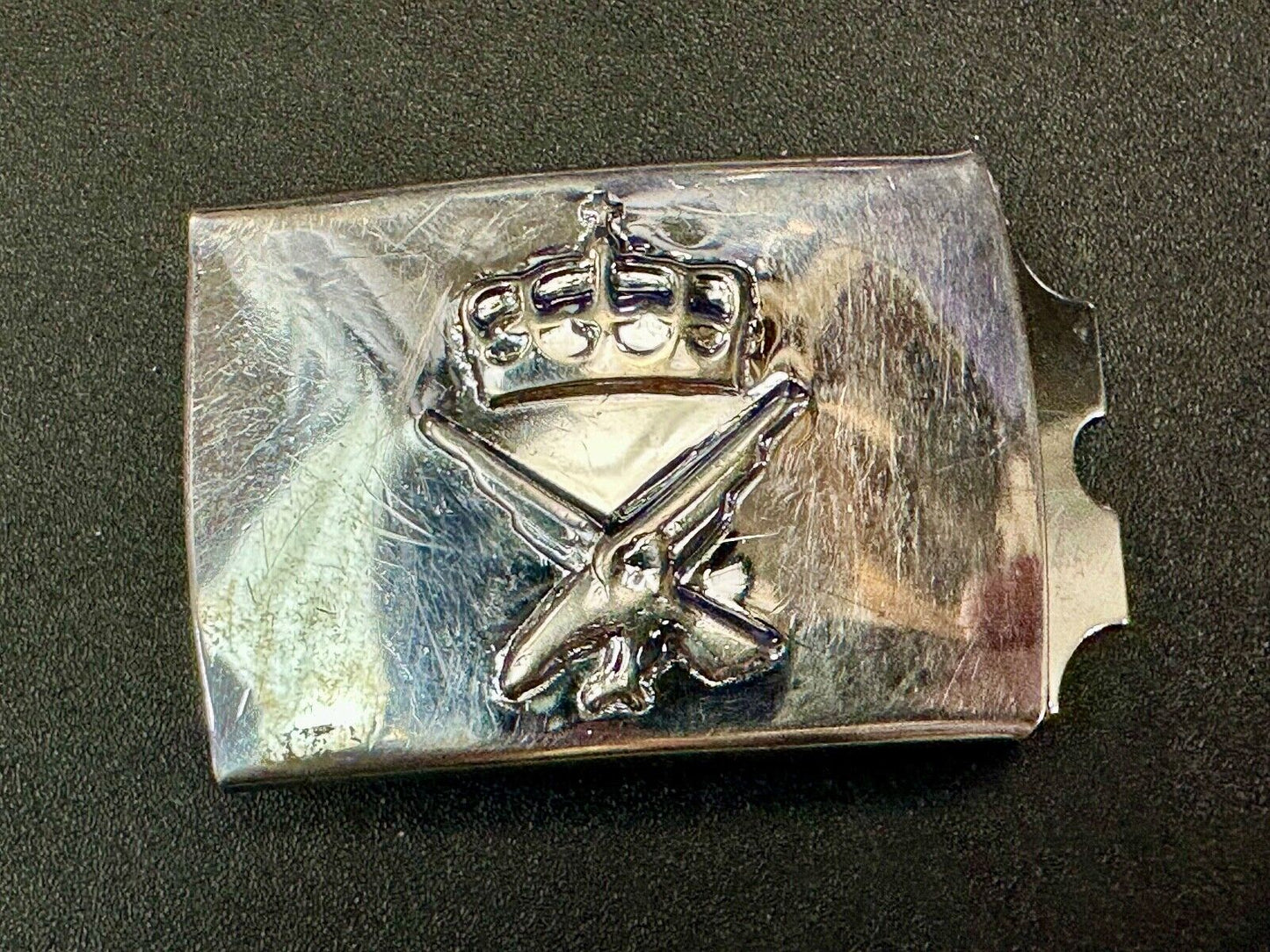 unknown to me!   dress style silver tone crown X crest? stamped belt buckle