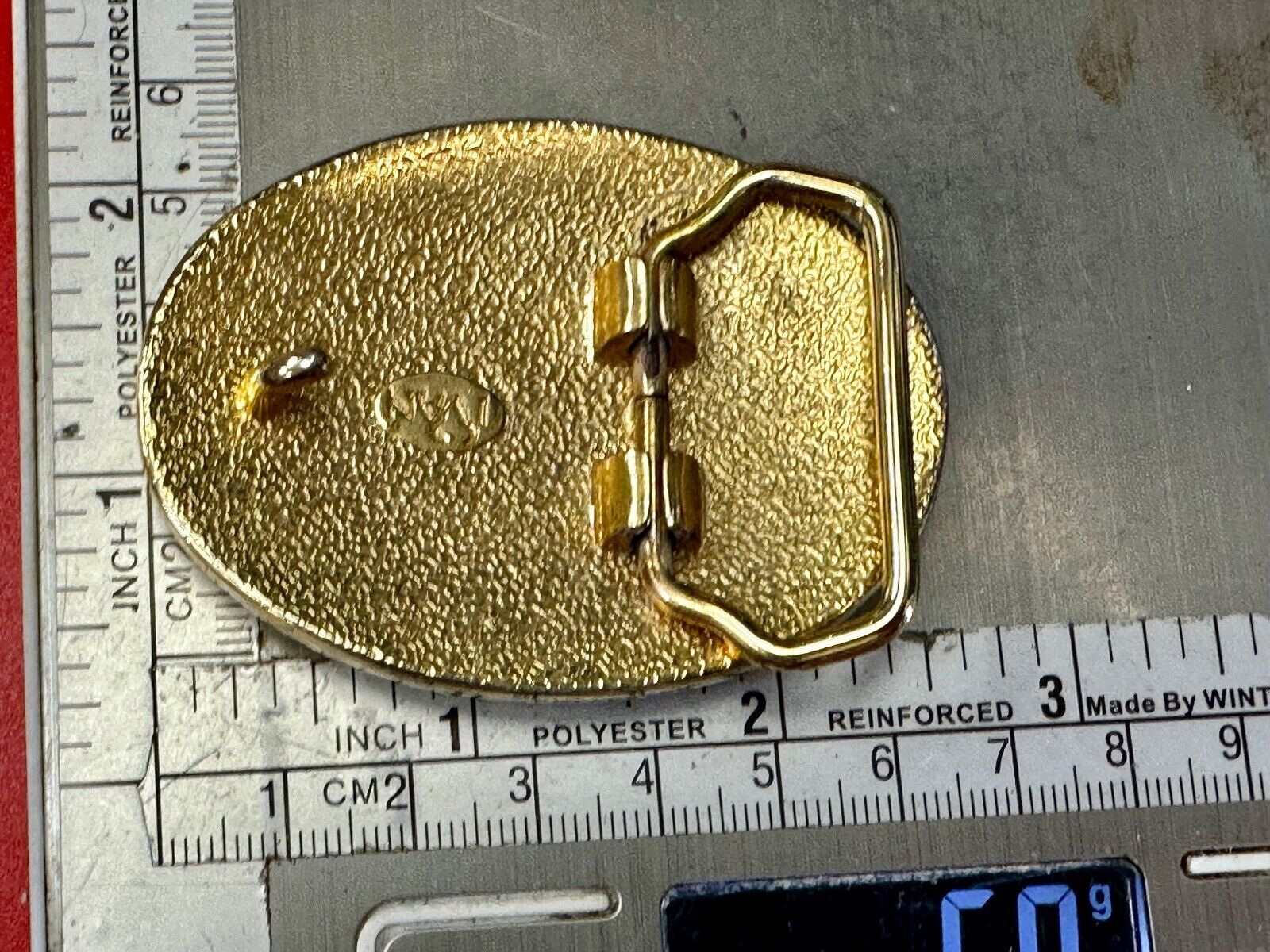 vintage Ivan Brand western flower swirl design two tone oval belt buckle