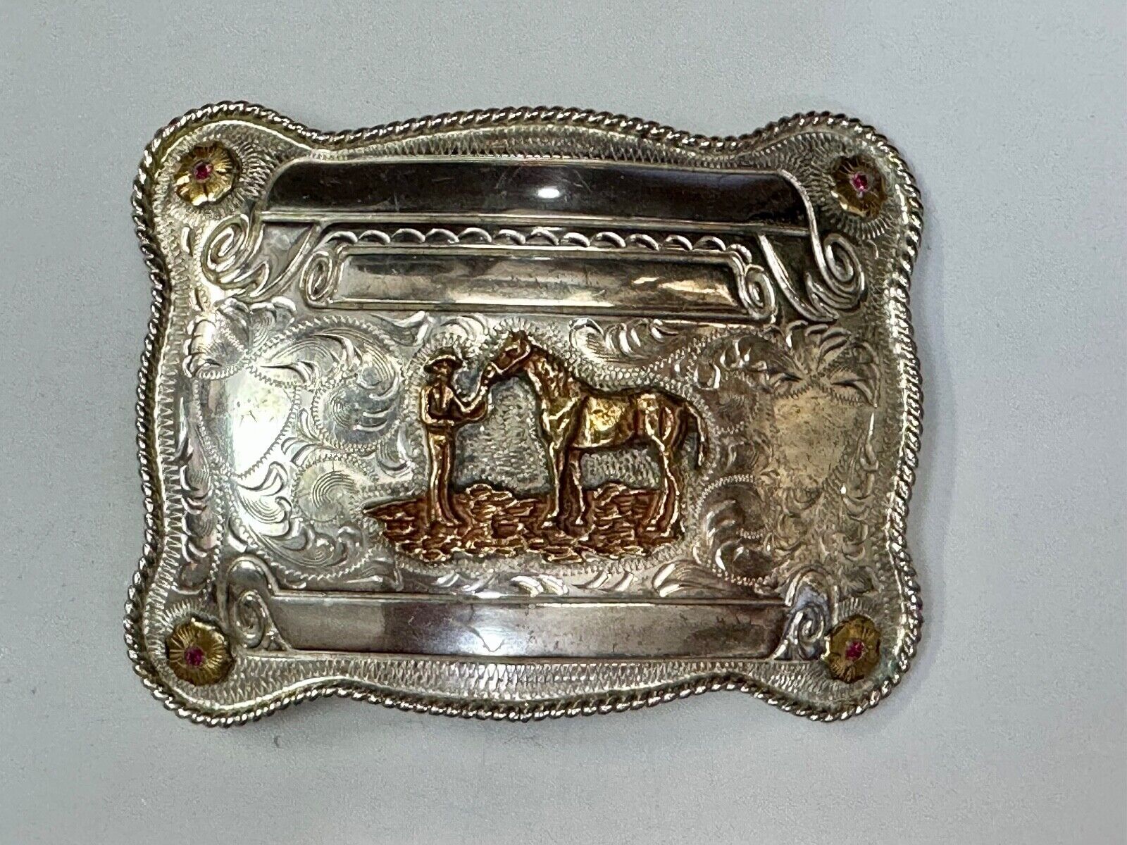 A man with his horse two tone, red ruby Belt Buckle - blank award scrolls