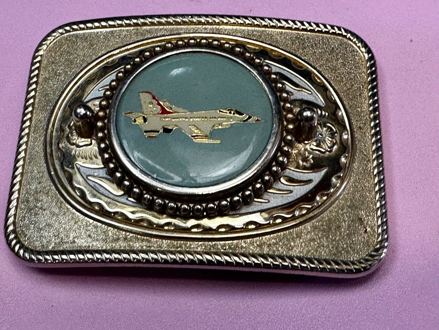 Us Air Force Fighter Jet as centerpiece in western Belt Buckle - or dollar coin