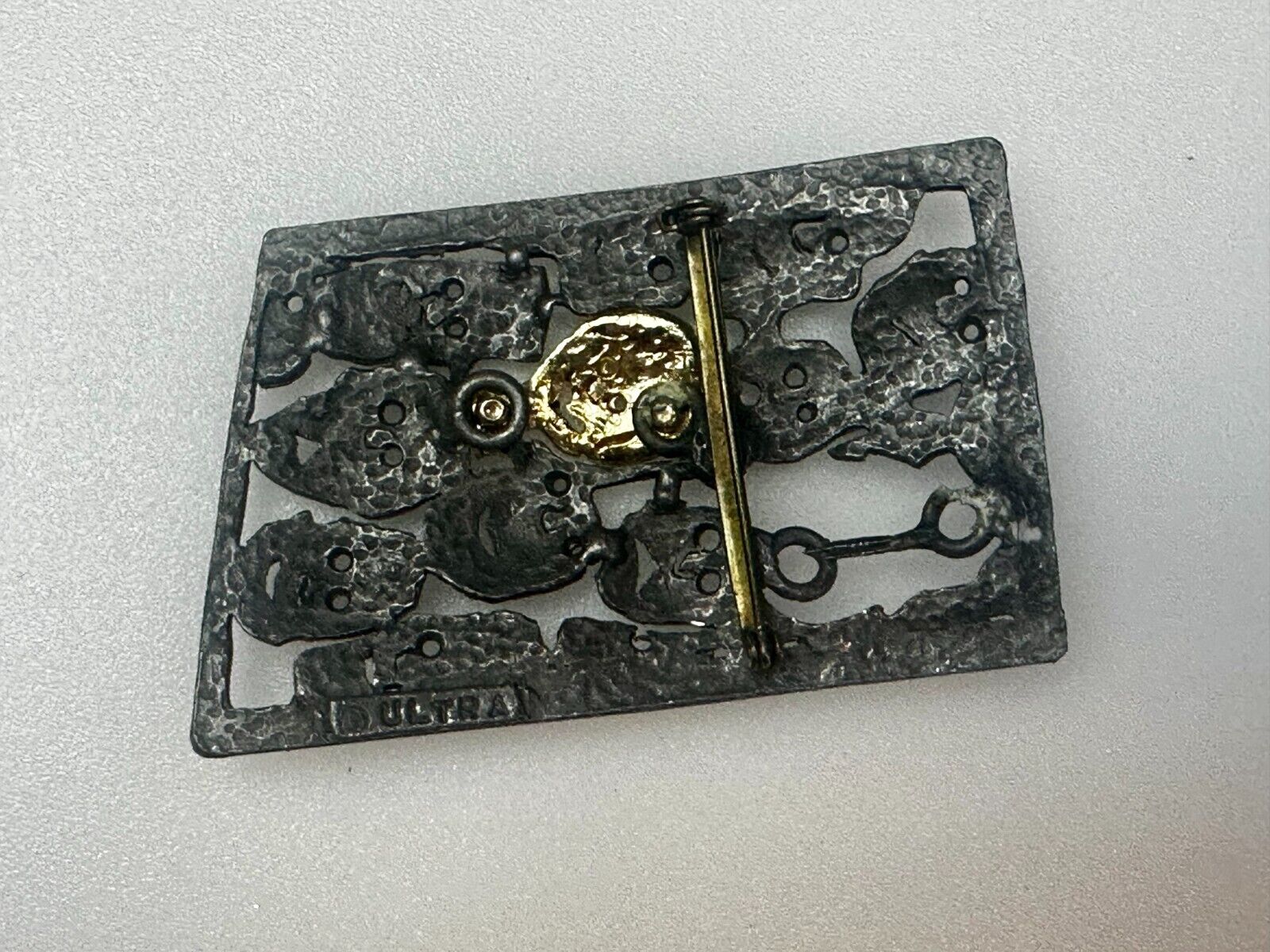 The Standout!  Many Faces in Asymmetric Frame Vintage Pewter Brooch Pin by Ultra