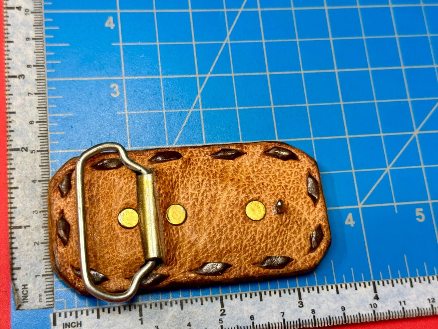 Vintage leaf pattern on stitched multi layer leather rectangular belt buckle