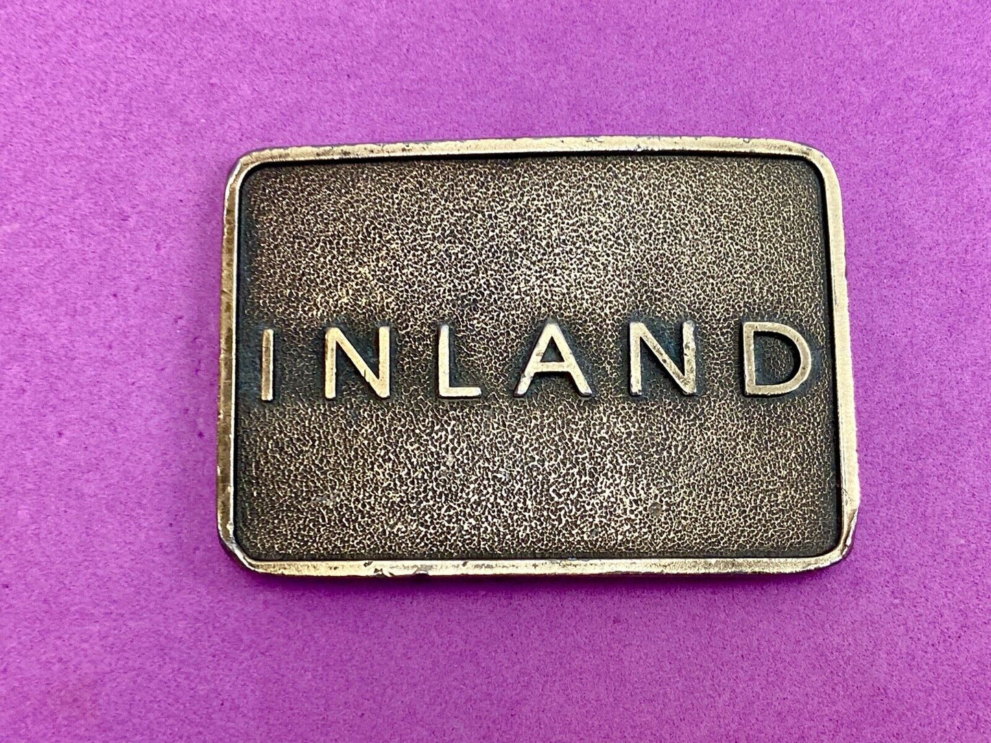 Vintage Inland company belt buckle - truck parts company 