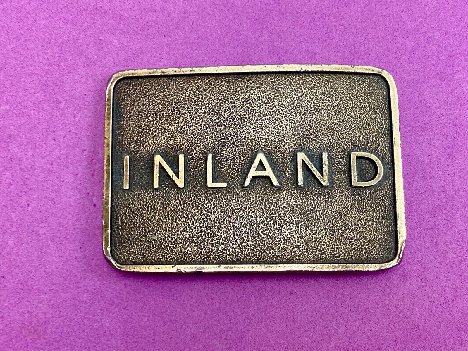 Vintage Inland company belt buckle - truck parts company 