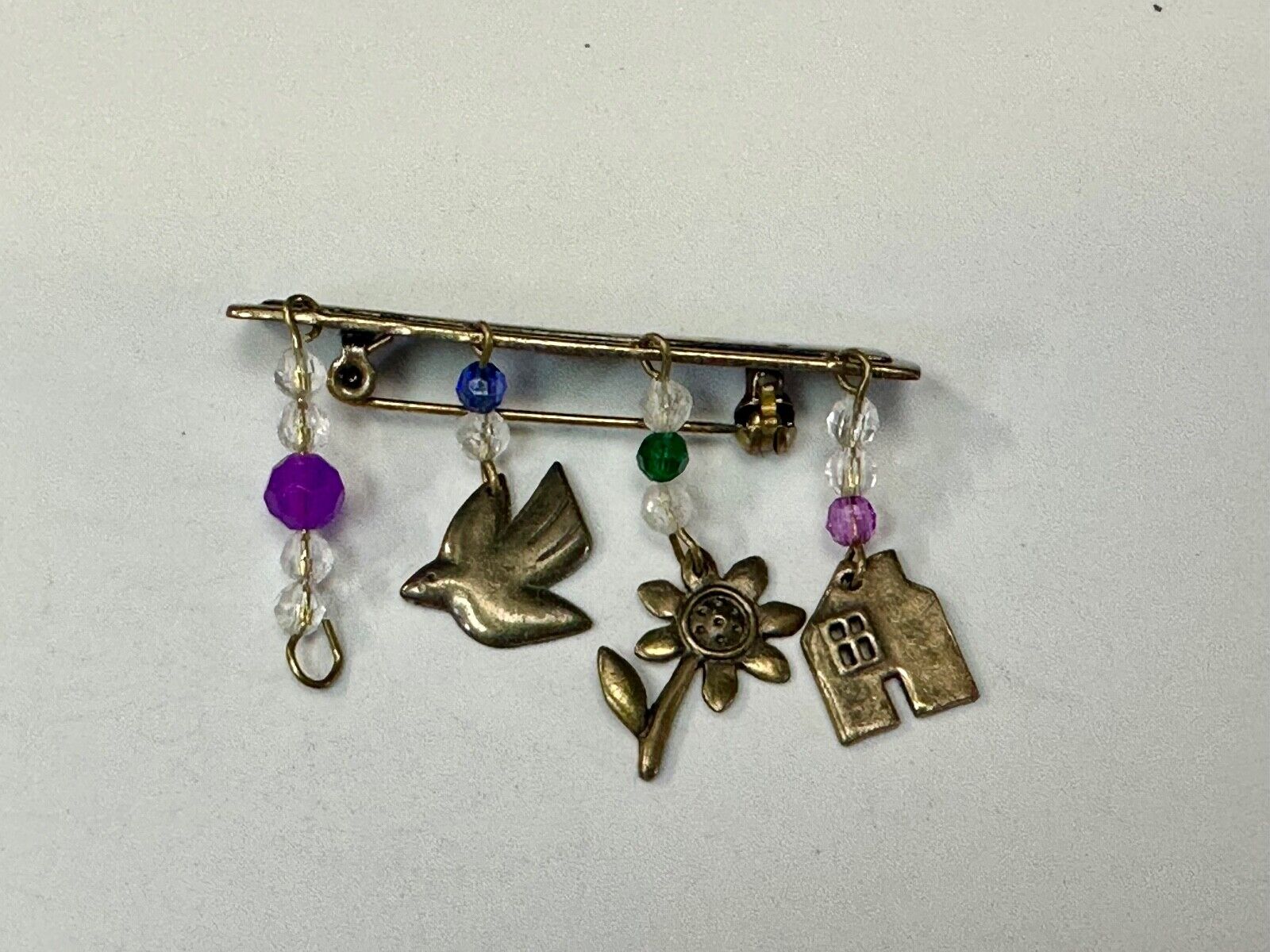 avon signed dangle brooch pin -  Dove stunflower house - missing a charm