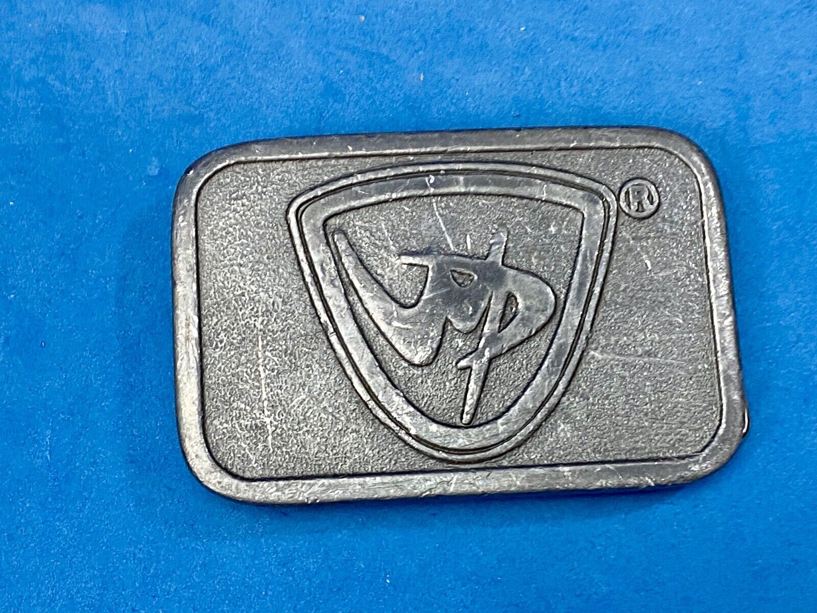 unknown to me, vintage metal belt buckle by HitLine INC.   Company Logo?
