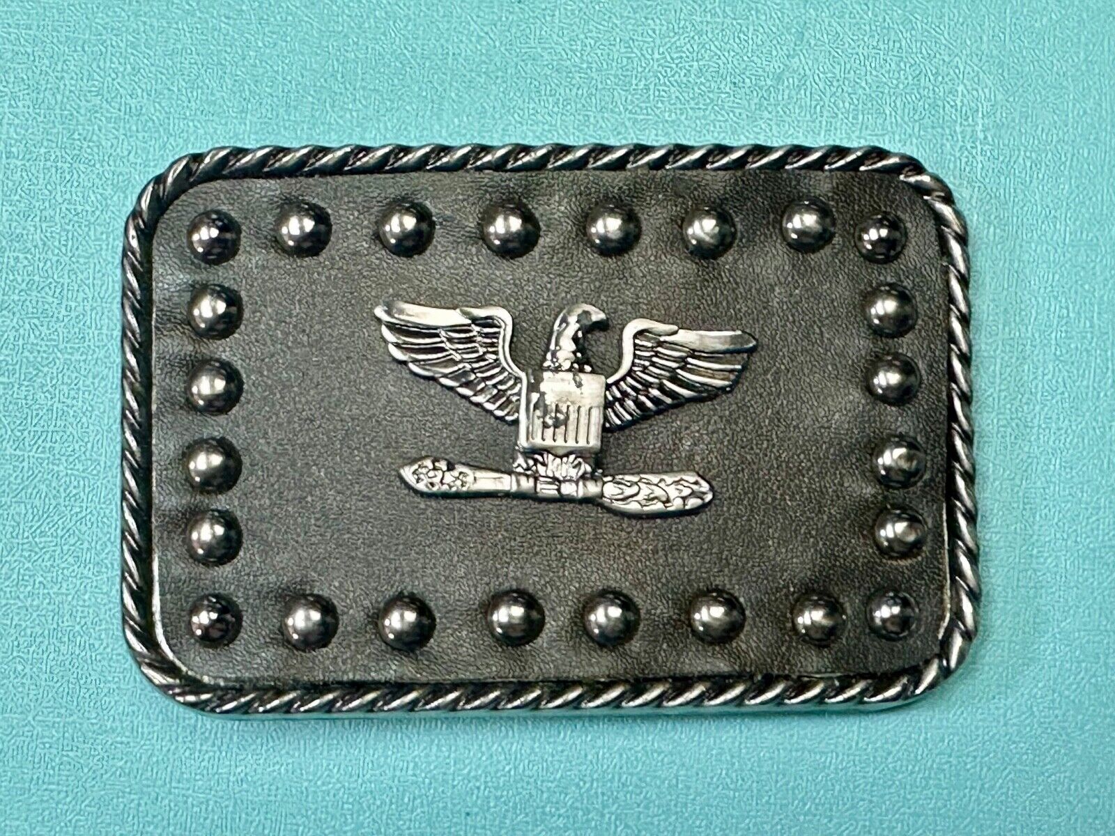 American Eagle - biker style studded black leather background belt buckle