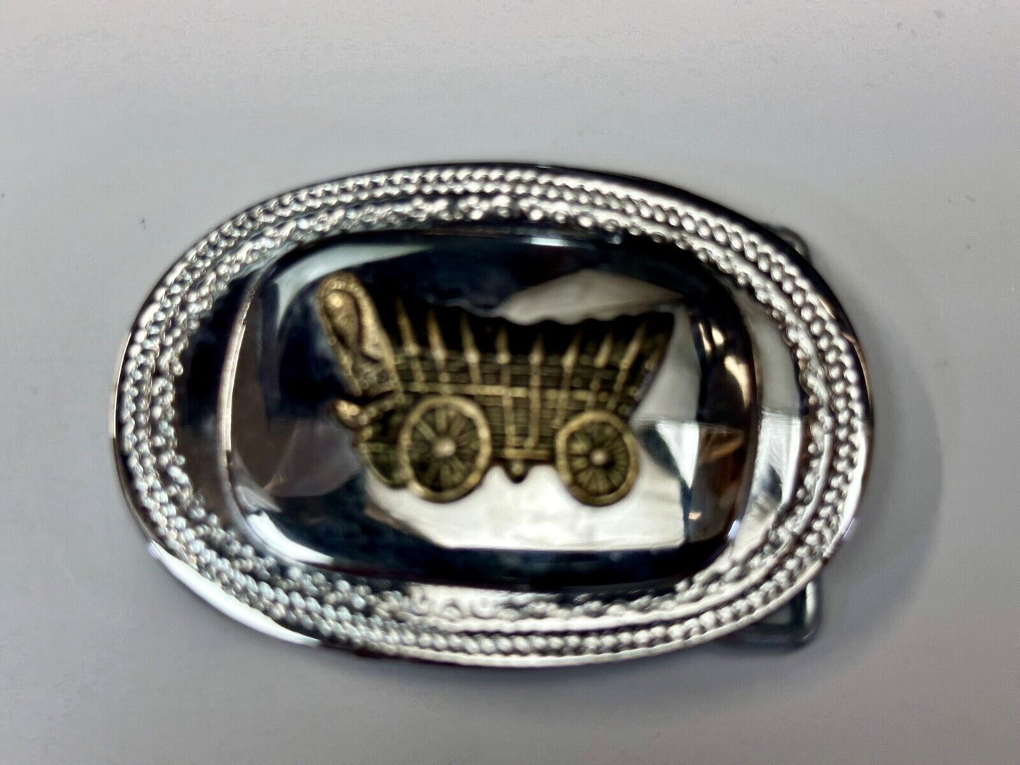 70s Covered Wagon two tone reflective oval ornate boarder belt buckle