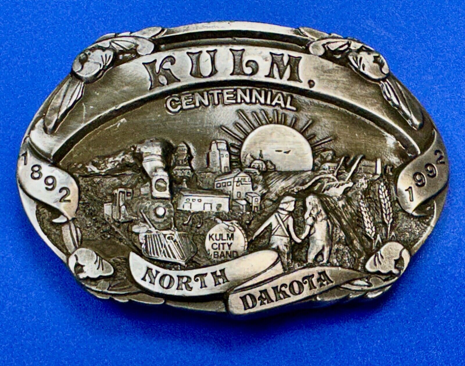 Vintage KULM North Dakota commemorative belt buckle by DART inc.