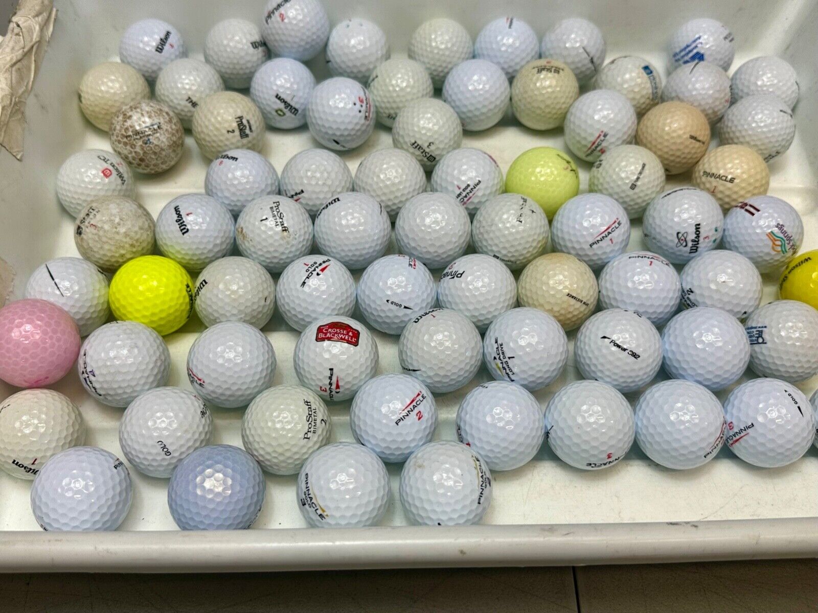 73 pc Used Golf Ball Lot. - Mostly Wilson Pinnacle