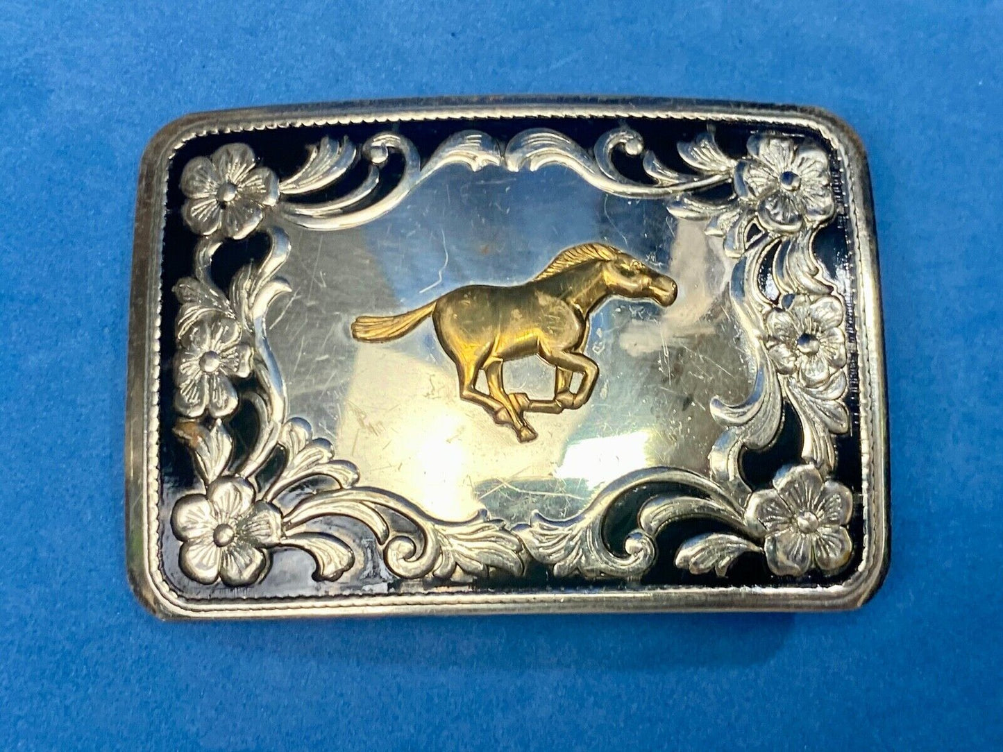 Antique Horse western Nickle Silver and black paint flower swirl belt buckle 