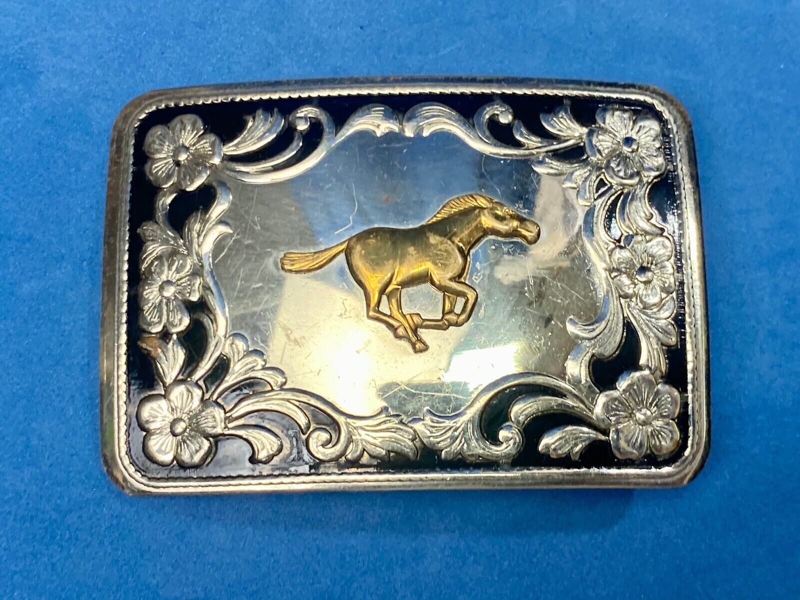 Antique Horse western Nickle Silver and black paint flower swirl belt buckle 