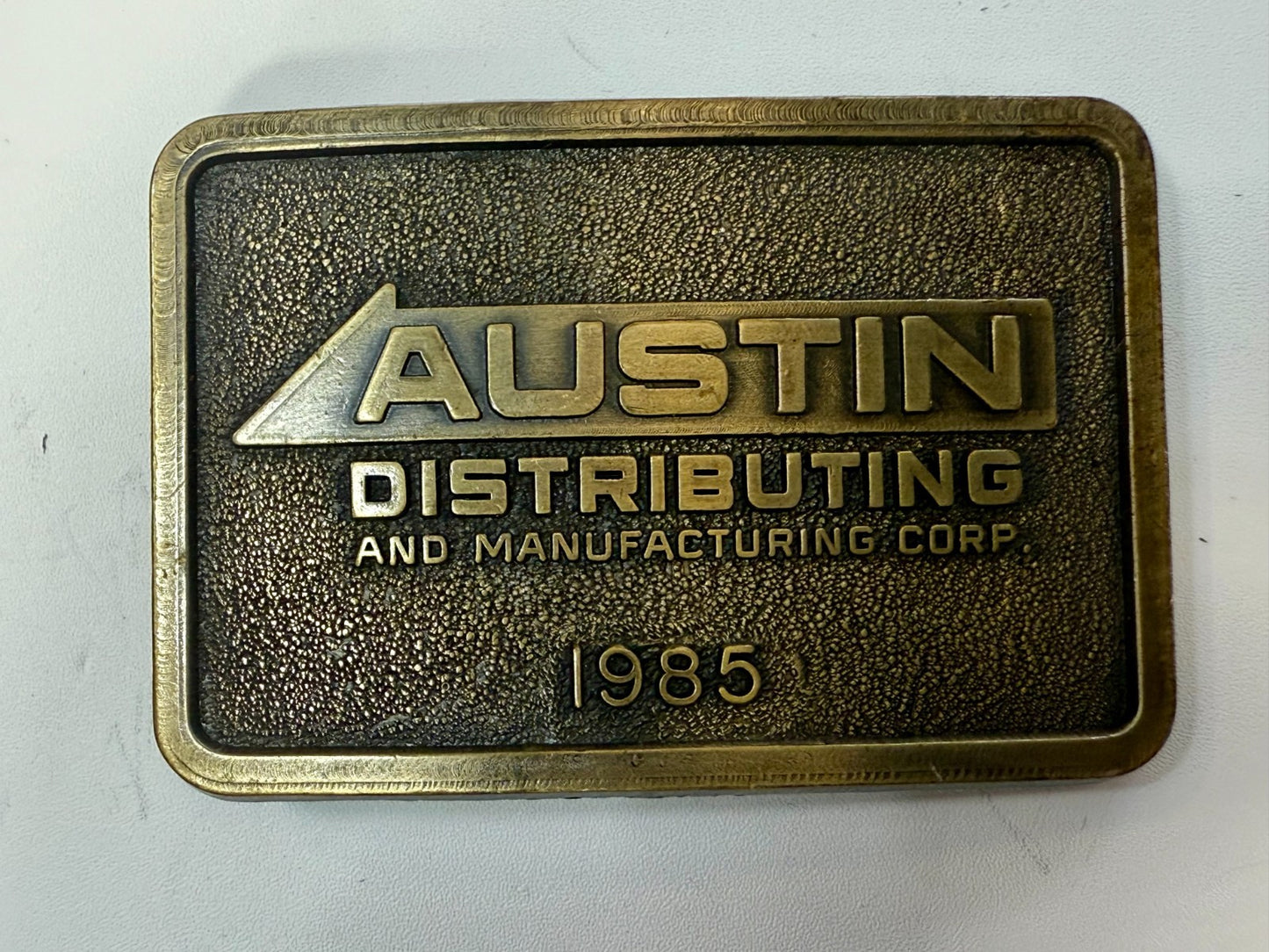 Austin Texas Distributing and Manufacturing Corp 1985 NOS RJ Belt Buckle