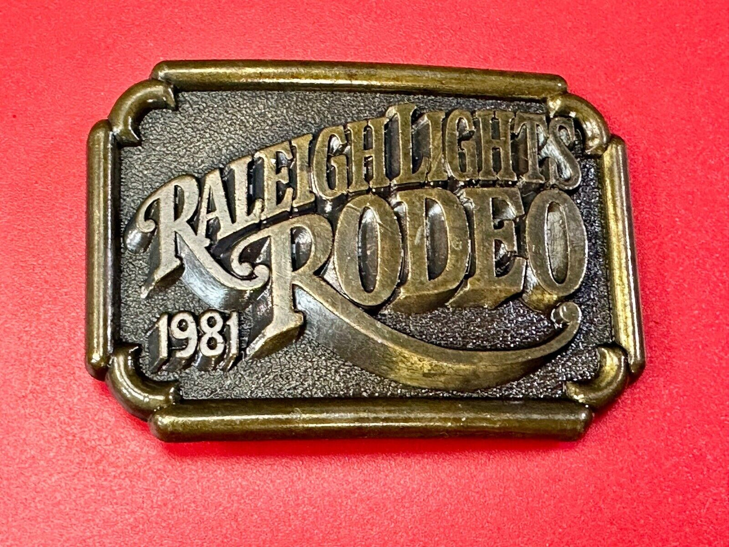 Vintage 1981 RALEIGH LIGHTS RODEO CIGARETTES SPONSOR Brass tone belt buckle