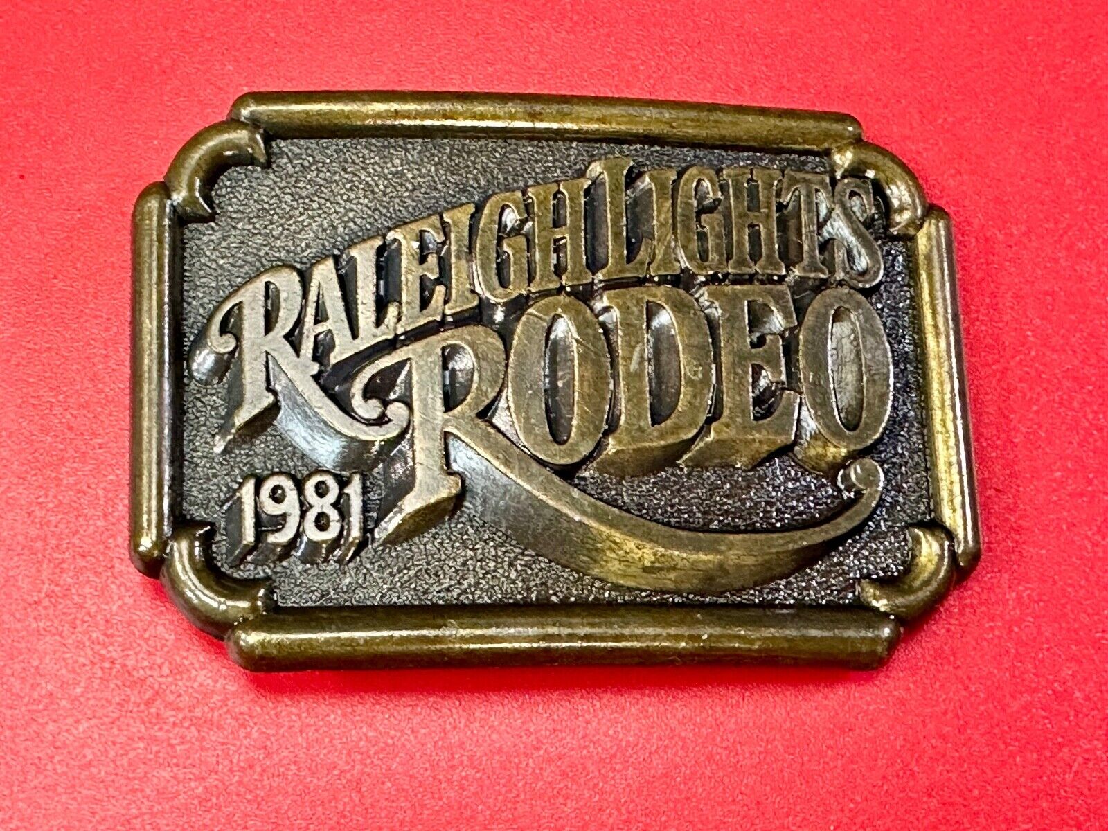 Vintage 1981 RALEIGH LIGHTS RODEO CIGARETTES SPONSOR Brass tone belt buckle