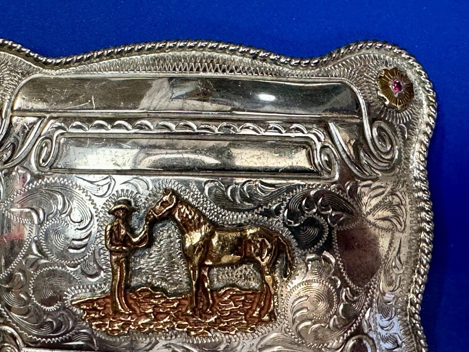 A man with his horse two tone, red ruby Belt Buckle - blank award scrolls
