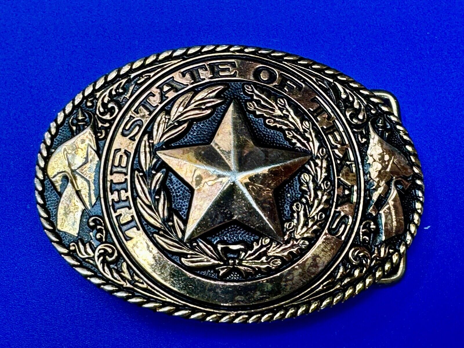 TEXAS State Pride - RAISED 3D STAR centered in brass tone oval Belt Buckle