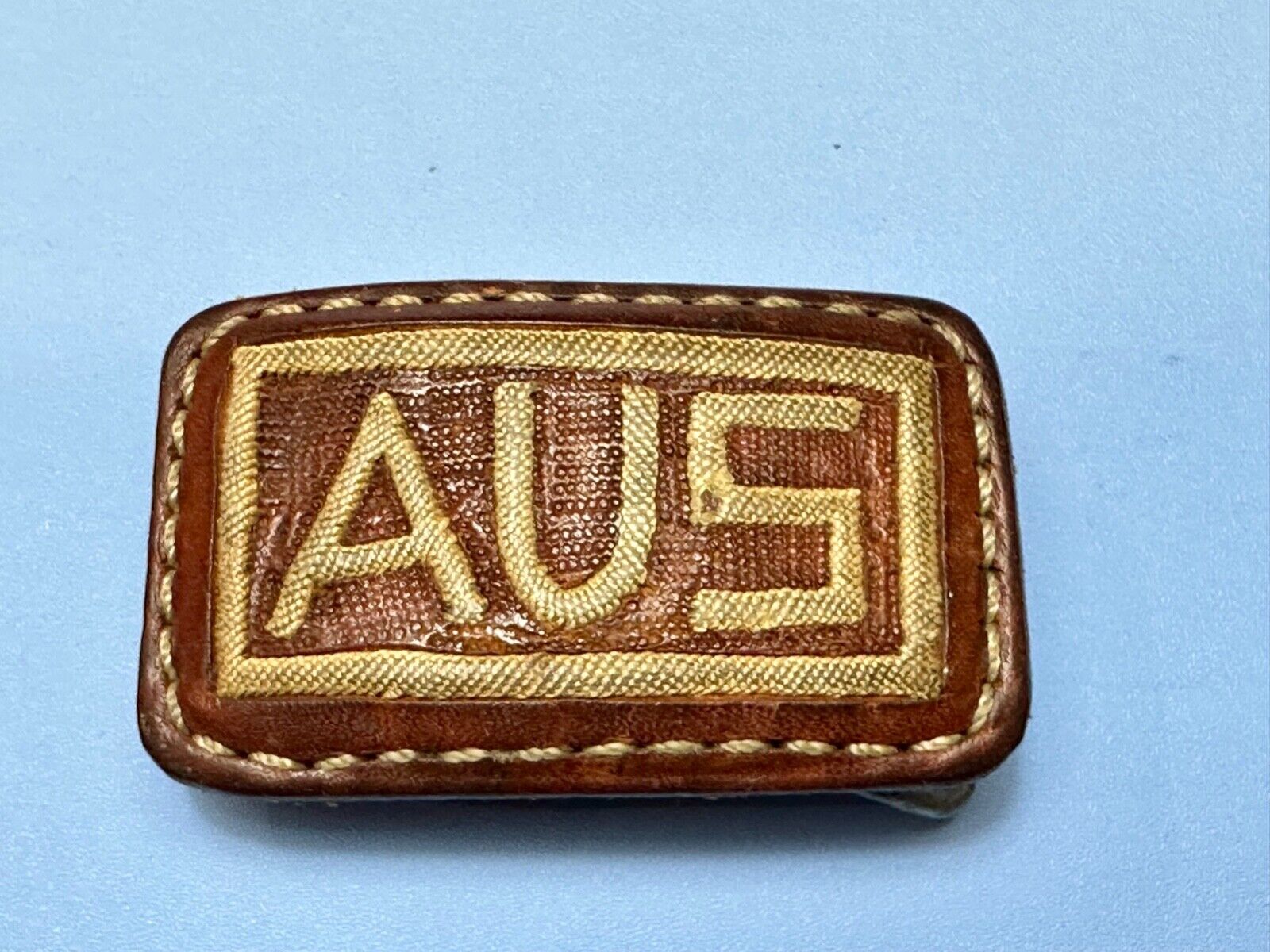 AUS  Brown leather with cream color Stitching  pre loved belt buckle