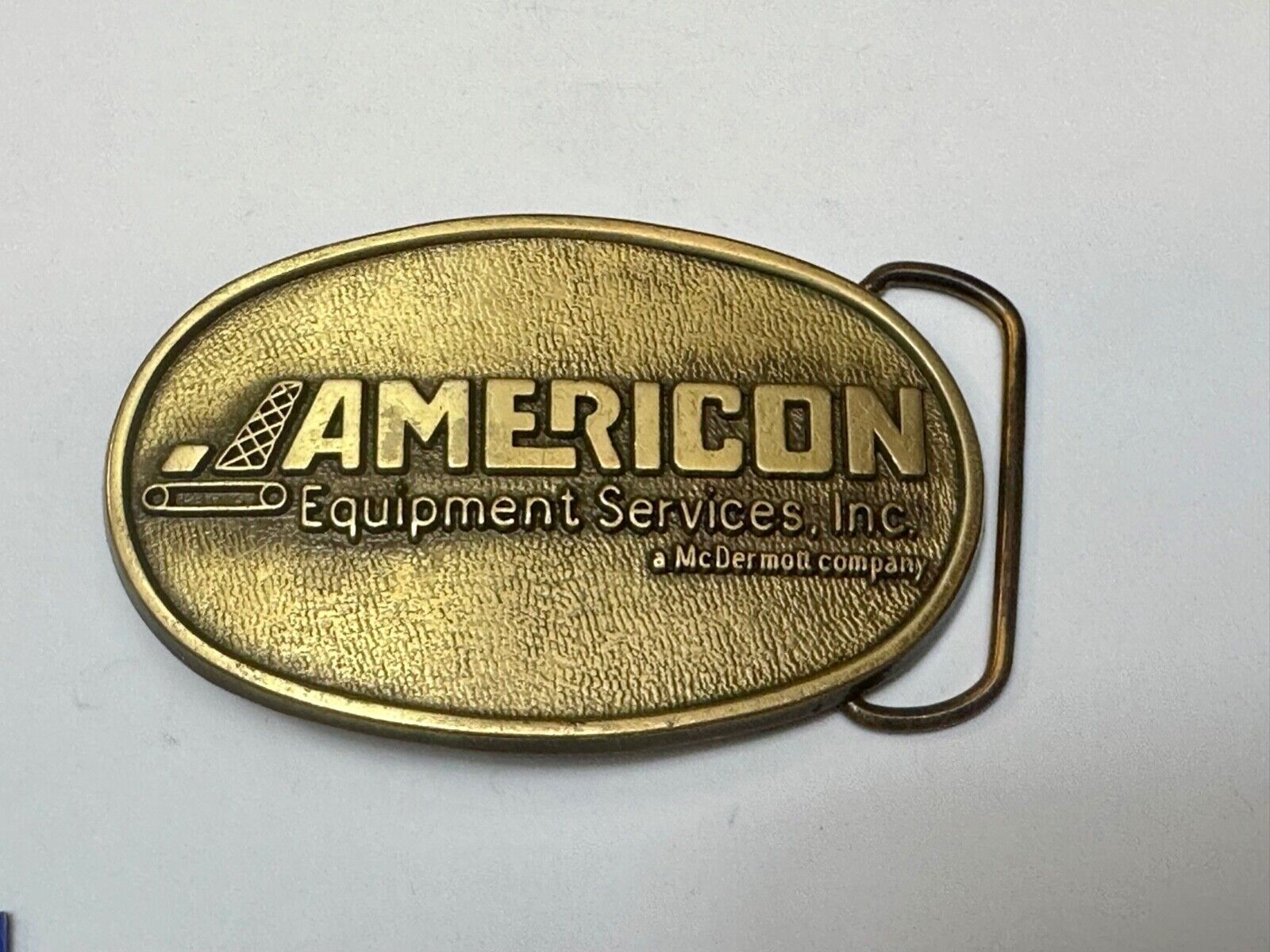 American Equipment services inc - McDermor Company Promotional belt buckle