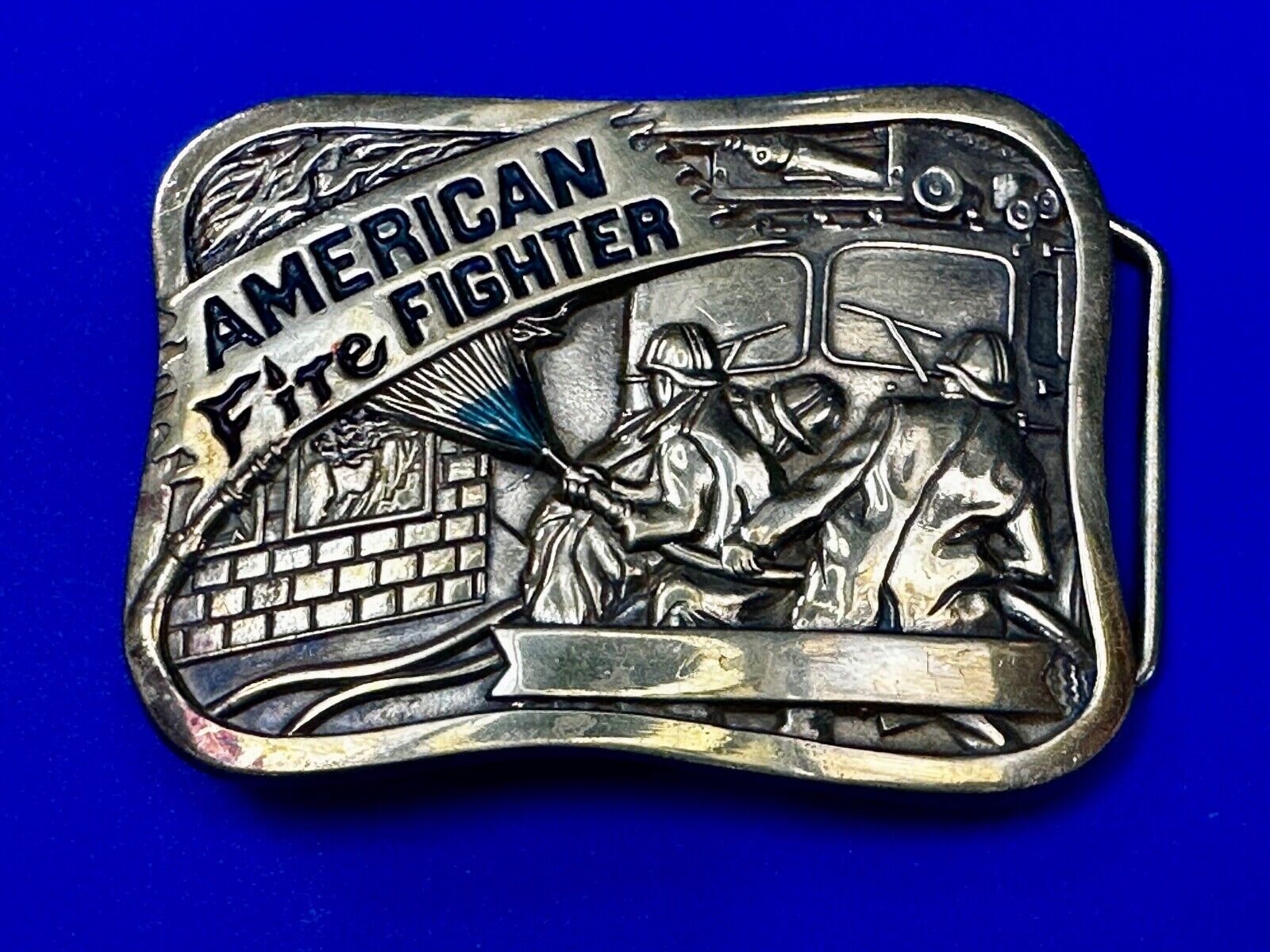 American Firefighters at work putting out fire Vintage 1981 Baron Belt Buckle