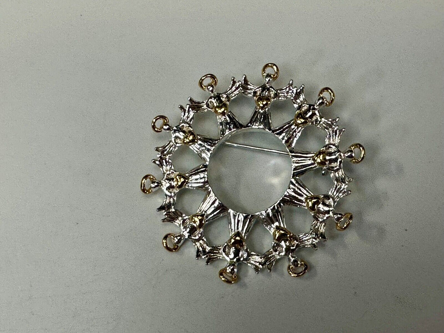 Angles in Circular pattern holiday wreath Avon signed vintage brooch pin