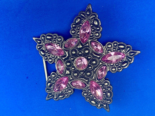 Beautiful figural star with pink accent rhinestones 