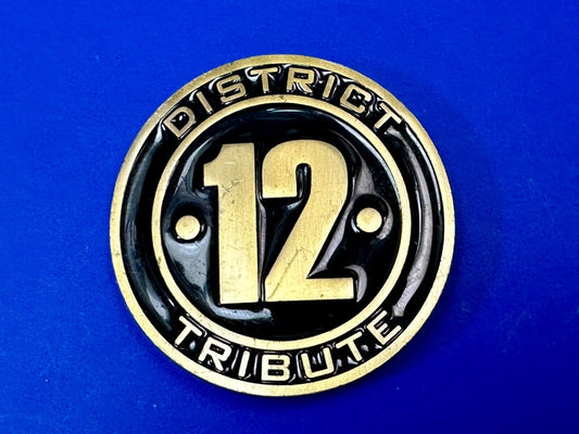 The Hunger Games, District 12 Tribute - Movie Book Emblem belt buckle