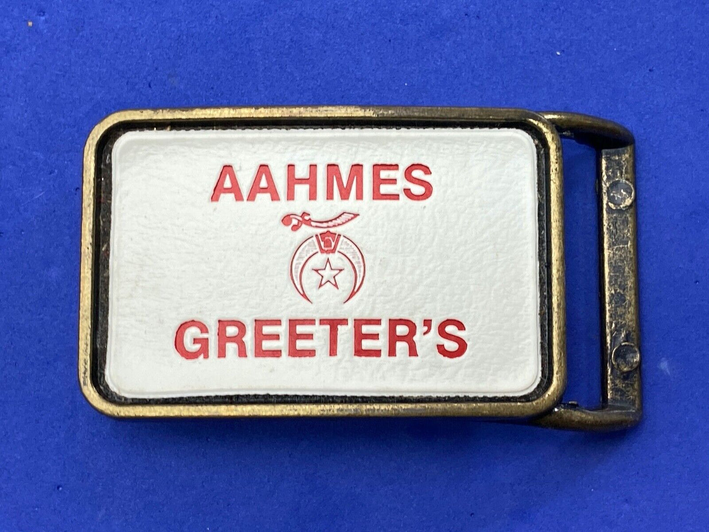 Aahmes Greeters Shriners, or Shrine Masons Club logo - white leather belt buckle
