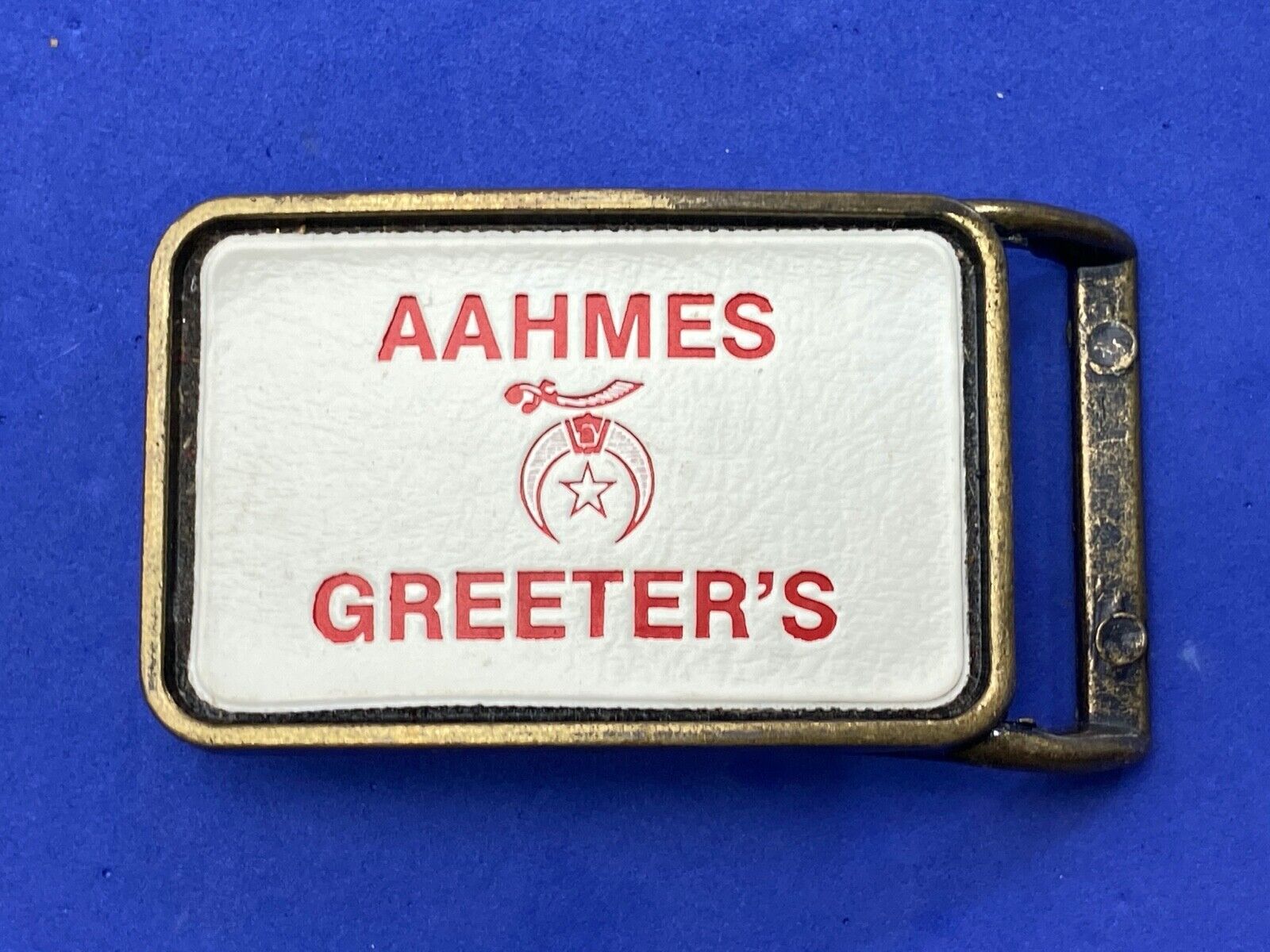 Aahmes Greeters Shriners, or Shrine Masons Club logo - white leather belt buckle