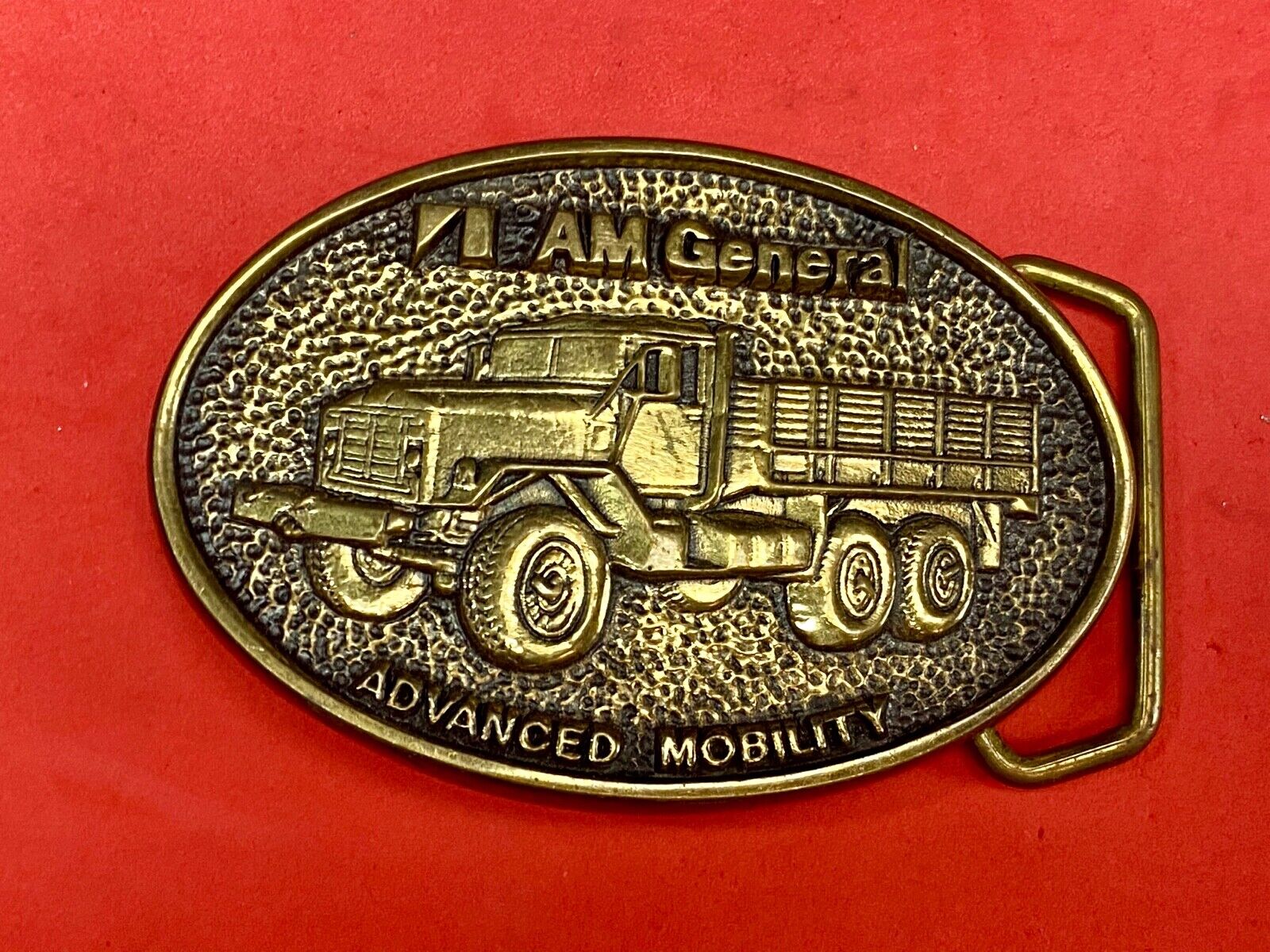AM General Advanced Mobility belt buckle 2nd in a collector series 5 Ton Trucks 