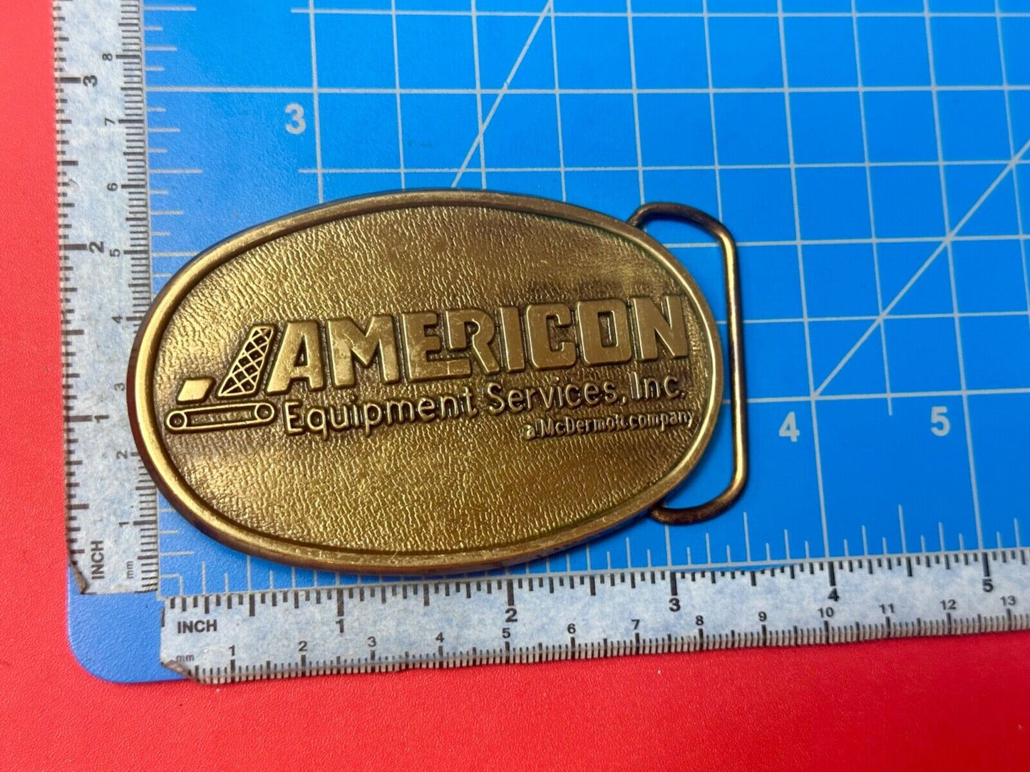 American Equipment services inc - McDermor Company Promotional belt buckle