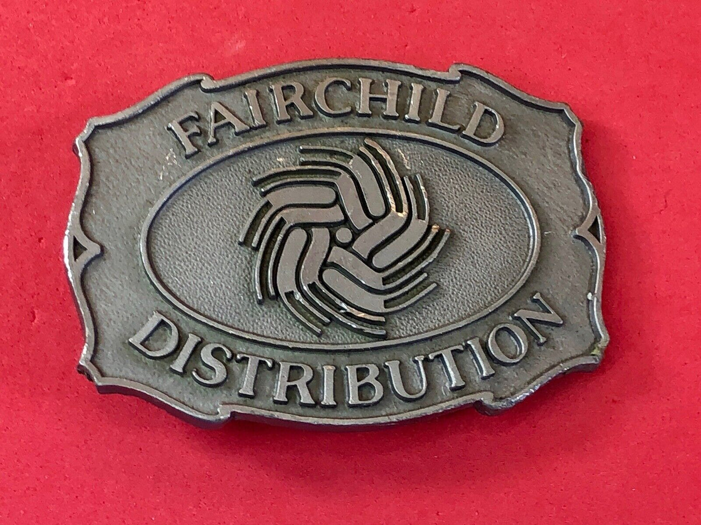 Vintage Fairchild Distribution company logo promotional belt buckle 
