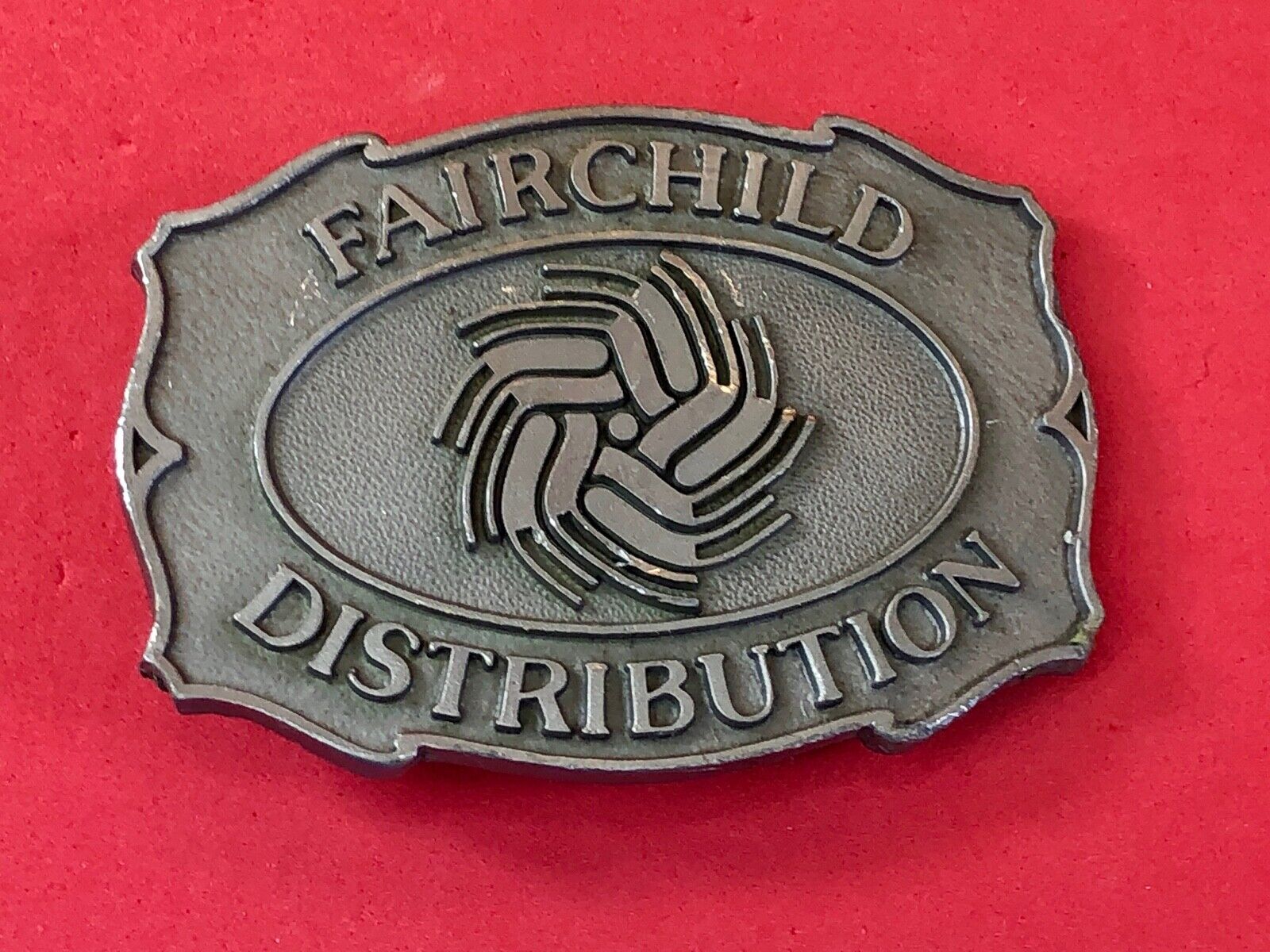 Vintage Fairchild Distribution company logo promotional belt buckle 