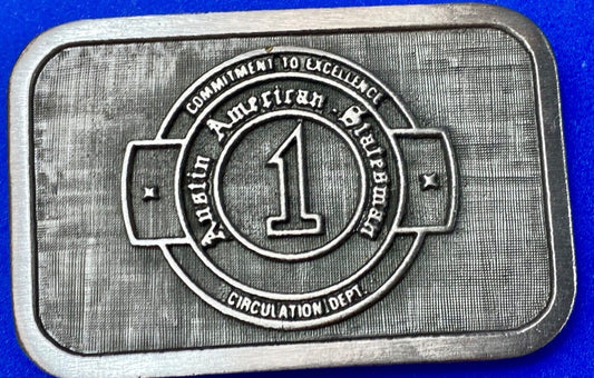 Asian  American  Circulation Dept Commitment to excellence belt buckle hit-line