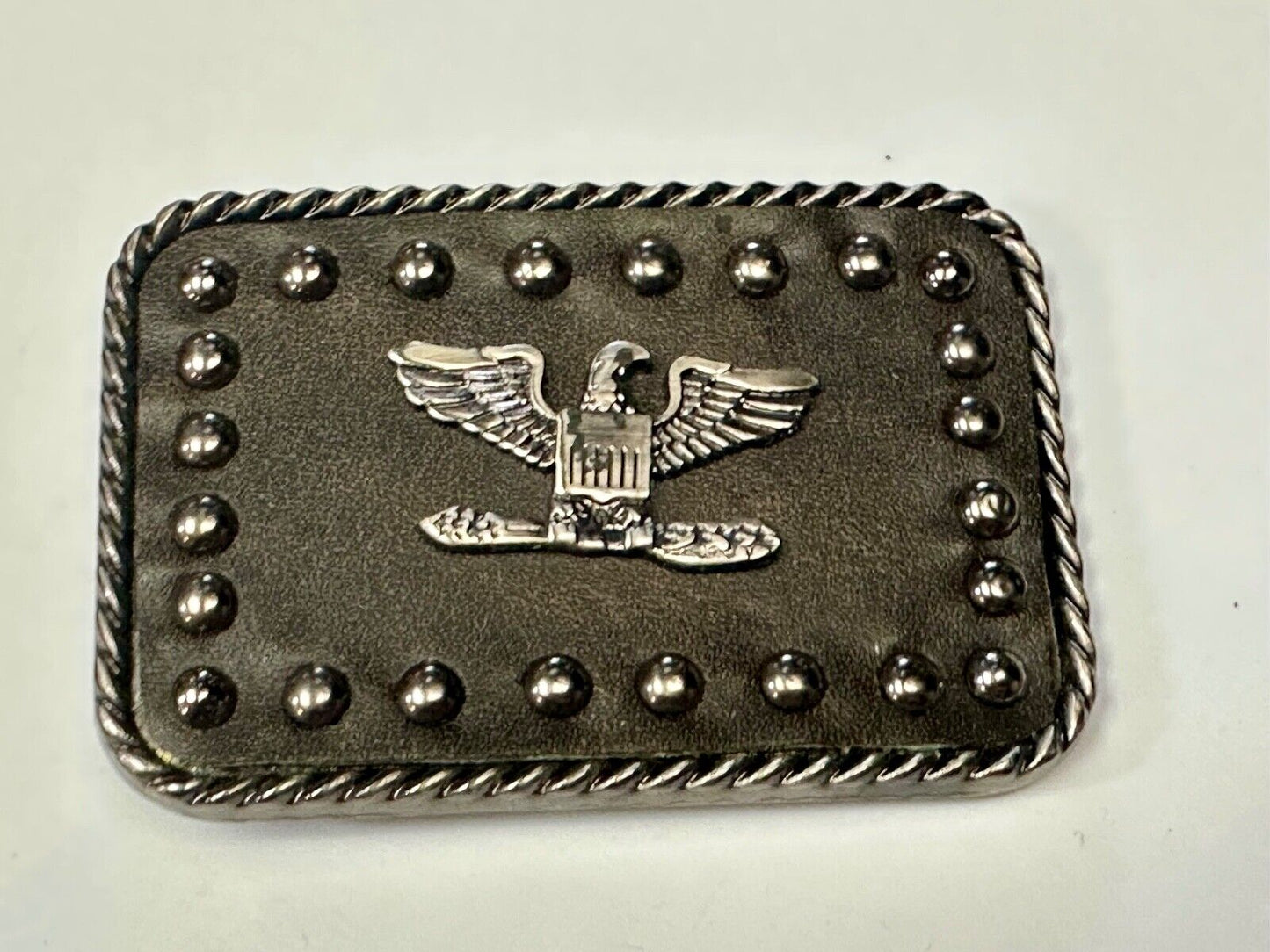 American Eagle - biker style studded black leather background belt buckle