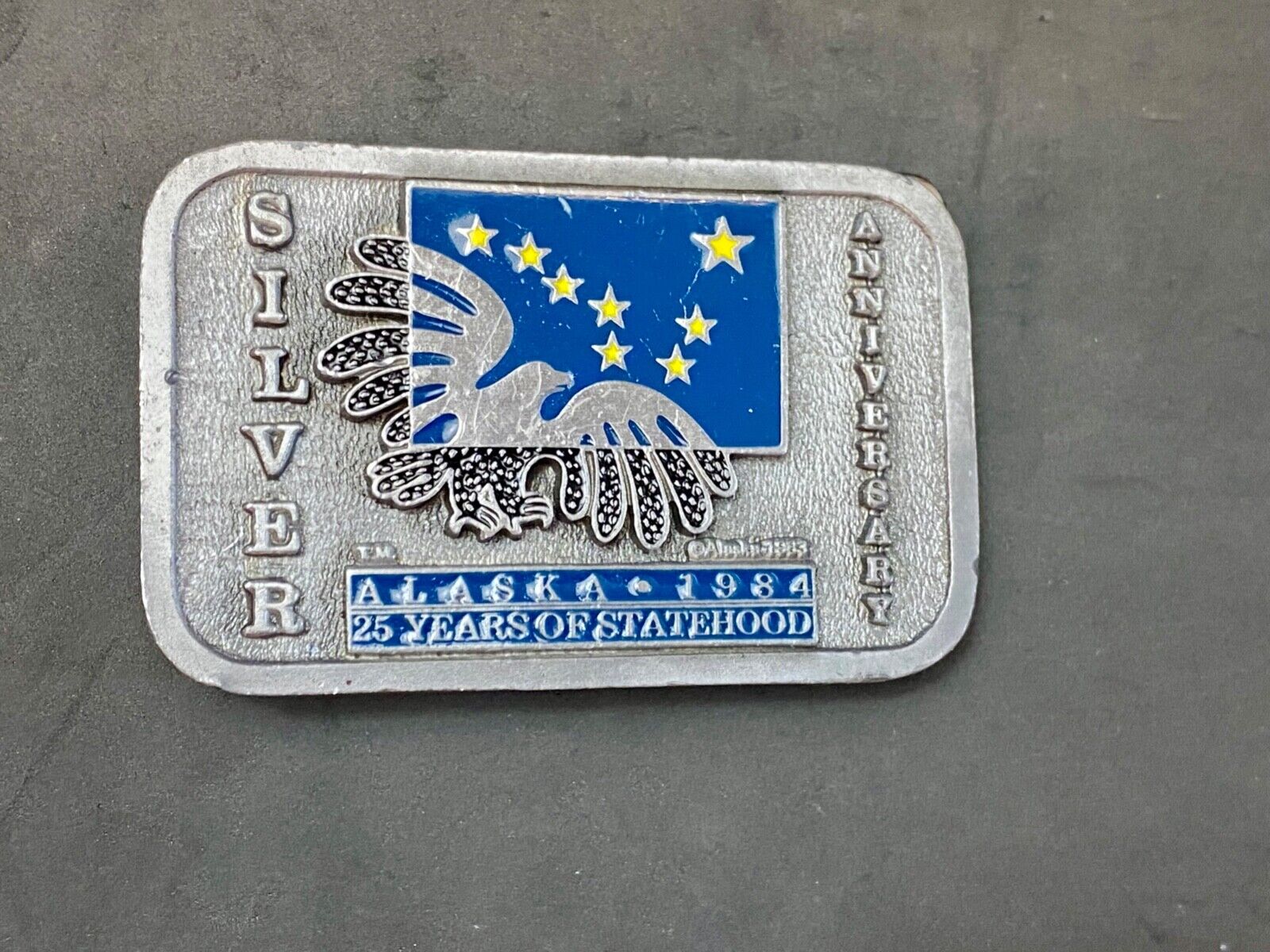 The great state of Alaska - Silver 25 year Anniversary belt buckle by Frontier