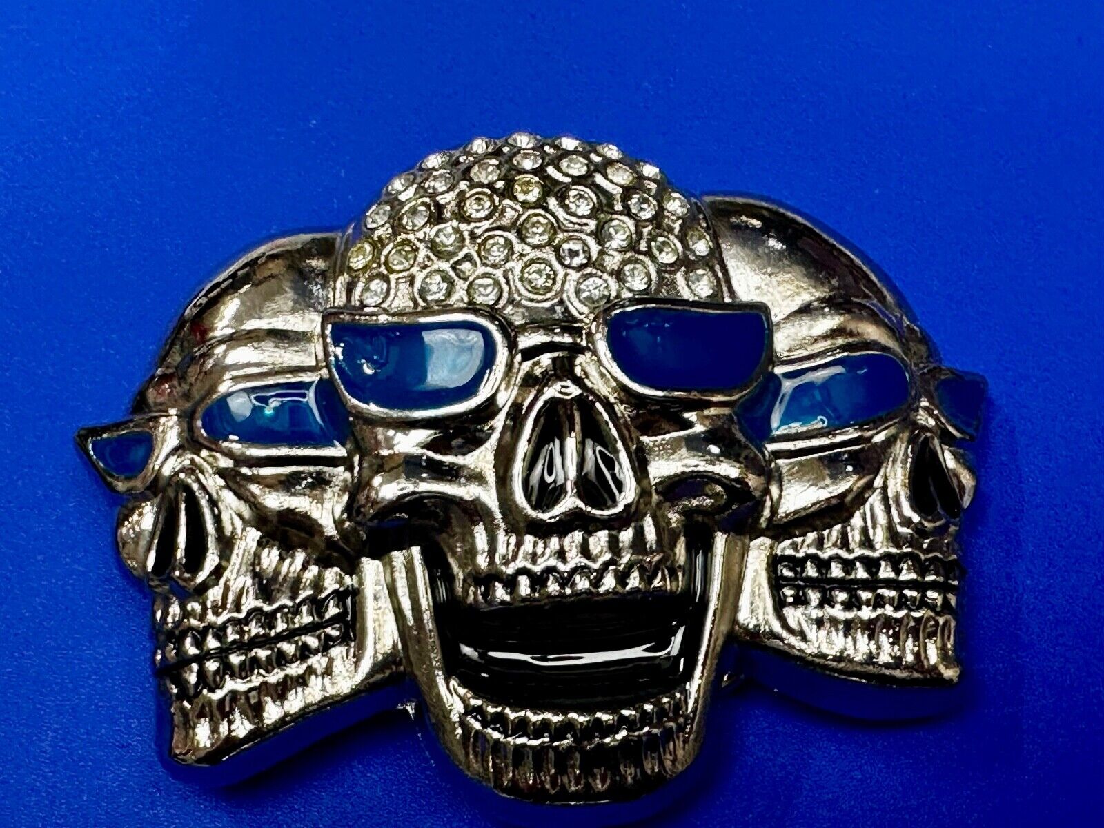 Three Skull's Heads Rhinestone Accented W/ Blue Shades Silver Tone Belt Buckle