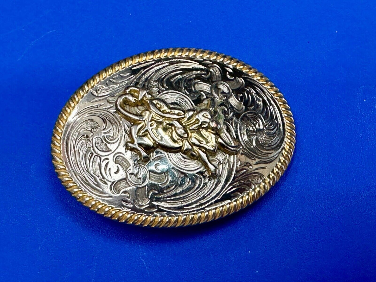 2.5" wide Two tone Vintage western rodeo cowboy belt buckle.