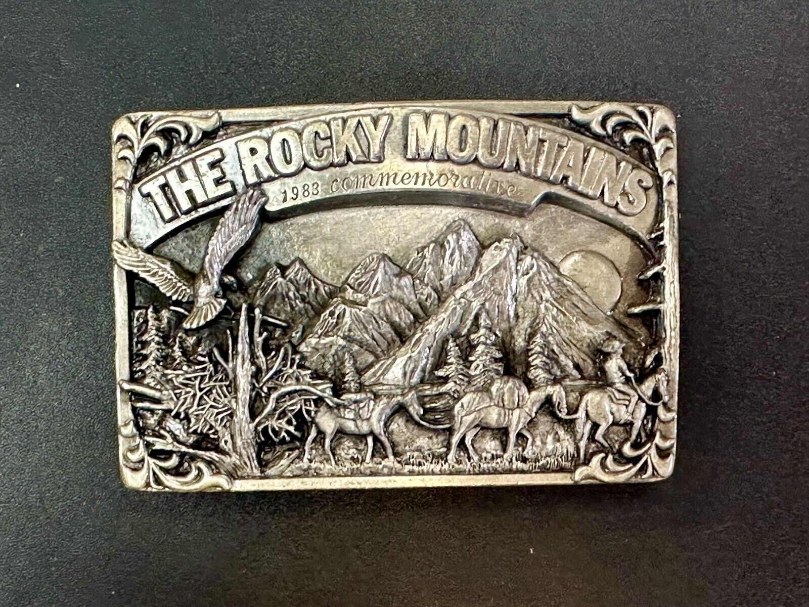 THE ROCKY MOUNTAINS** COMMEMORATIVE BELT BUCKLE VINTAGE 1983 BELT BUCKLE
