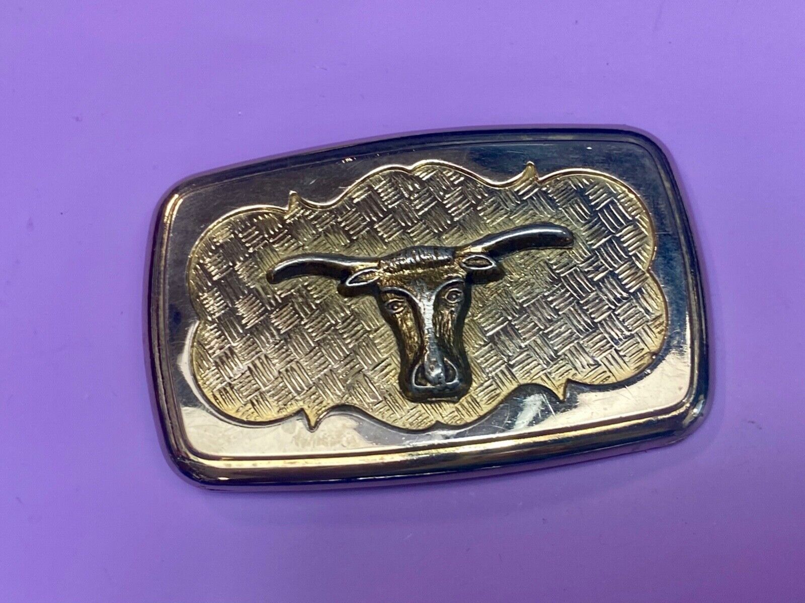 Vintage gold tone Texas Longhorn Steer mesh background western belt buckle