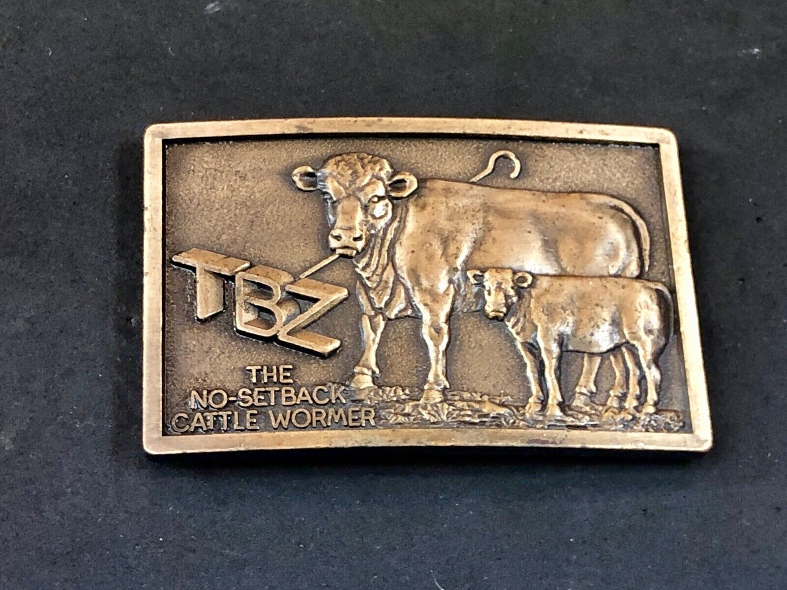 Vintage Farmers TBZ The No Setback cattle wormer belt buckle 