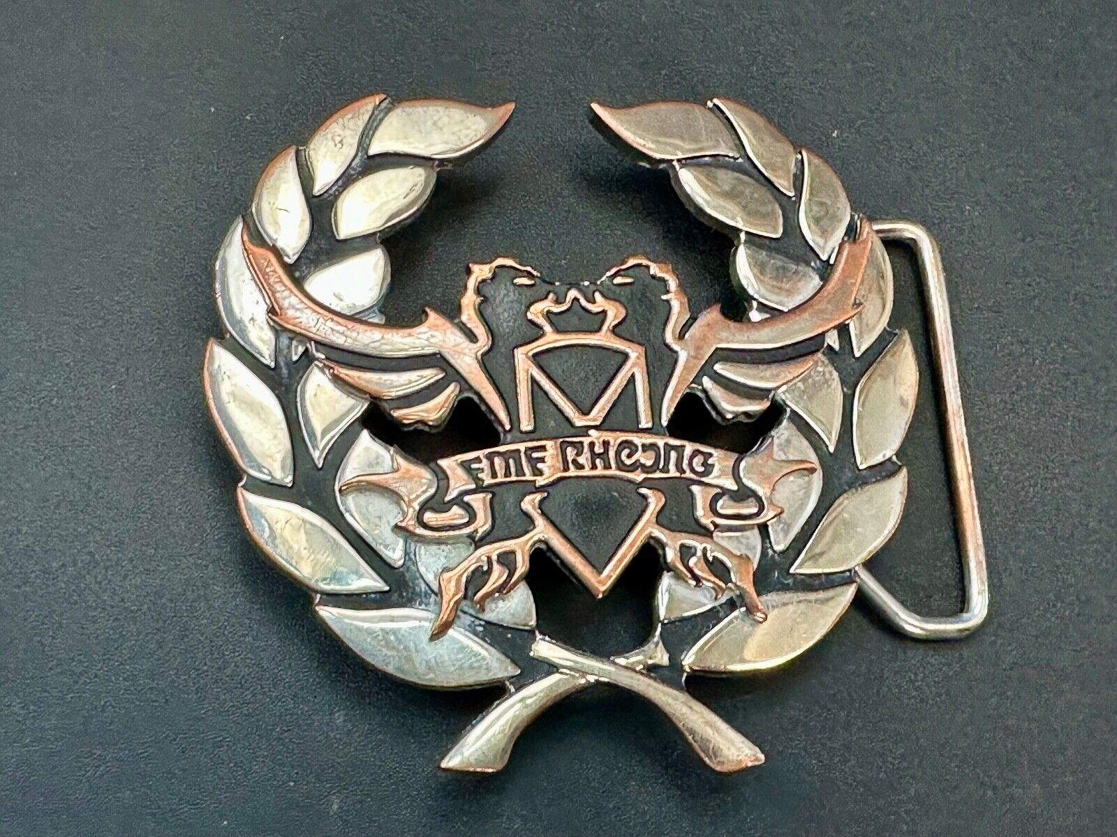 Two griffins?  FME RheJNG Olive branch cutout belt buckle