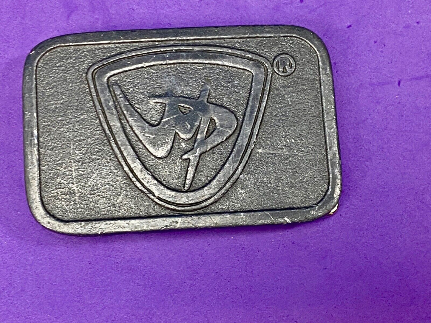 unknown to me, vintage metal belt buckle by HitLine INC.   Company Logo?