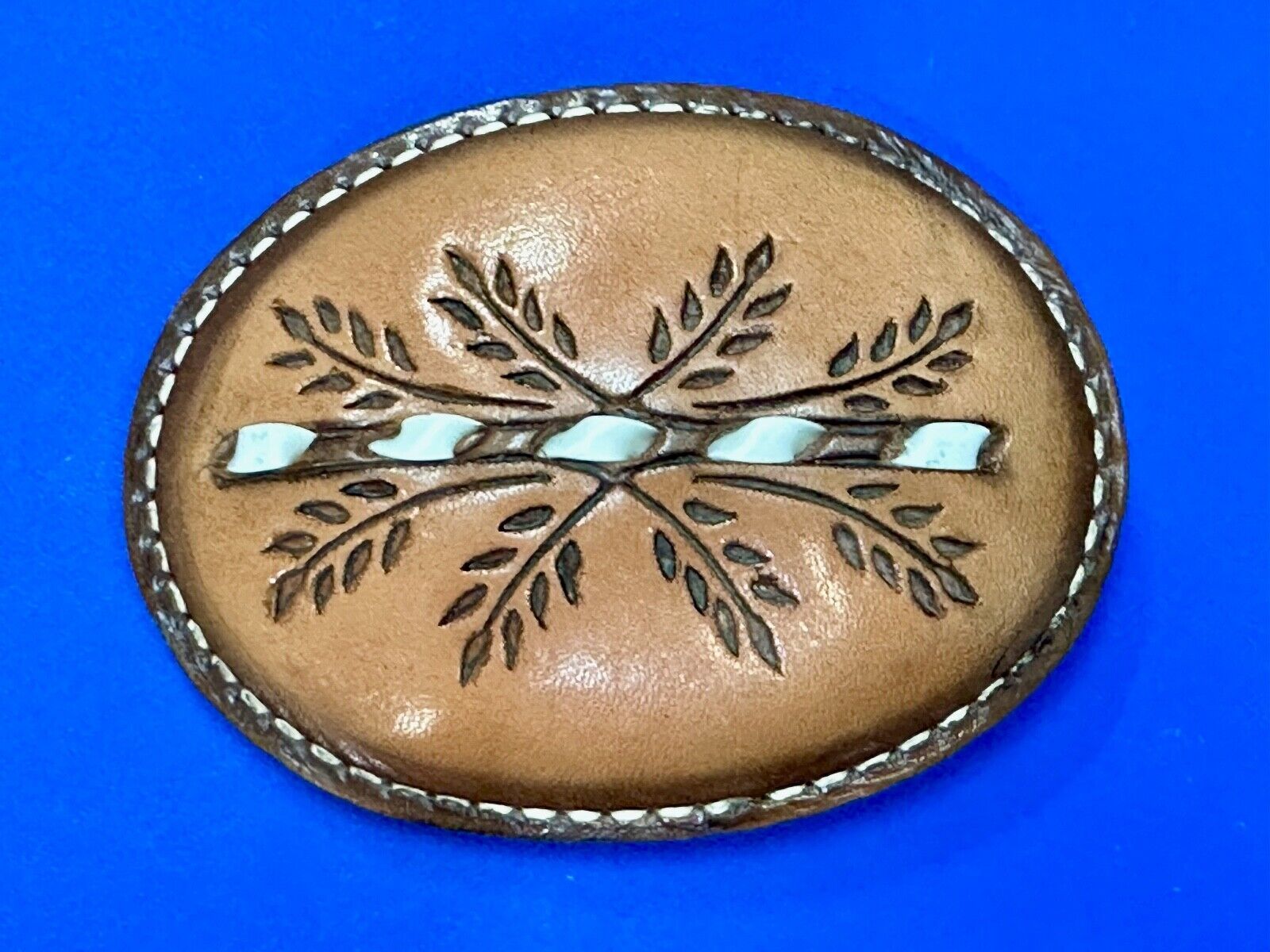 Beautiful Leather Factors Western oval mixed color / tooled Belt Buckle