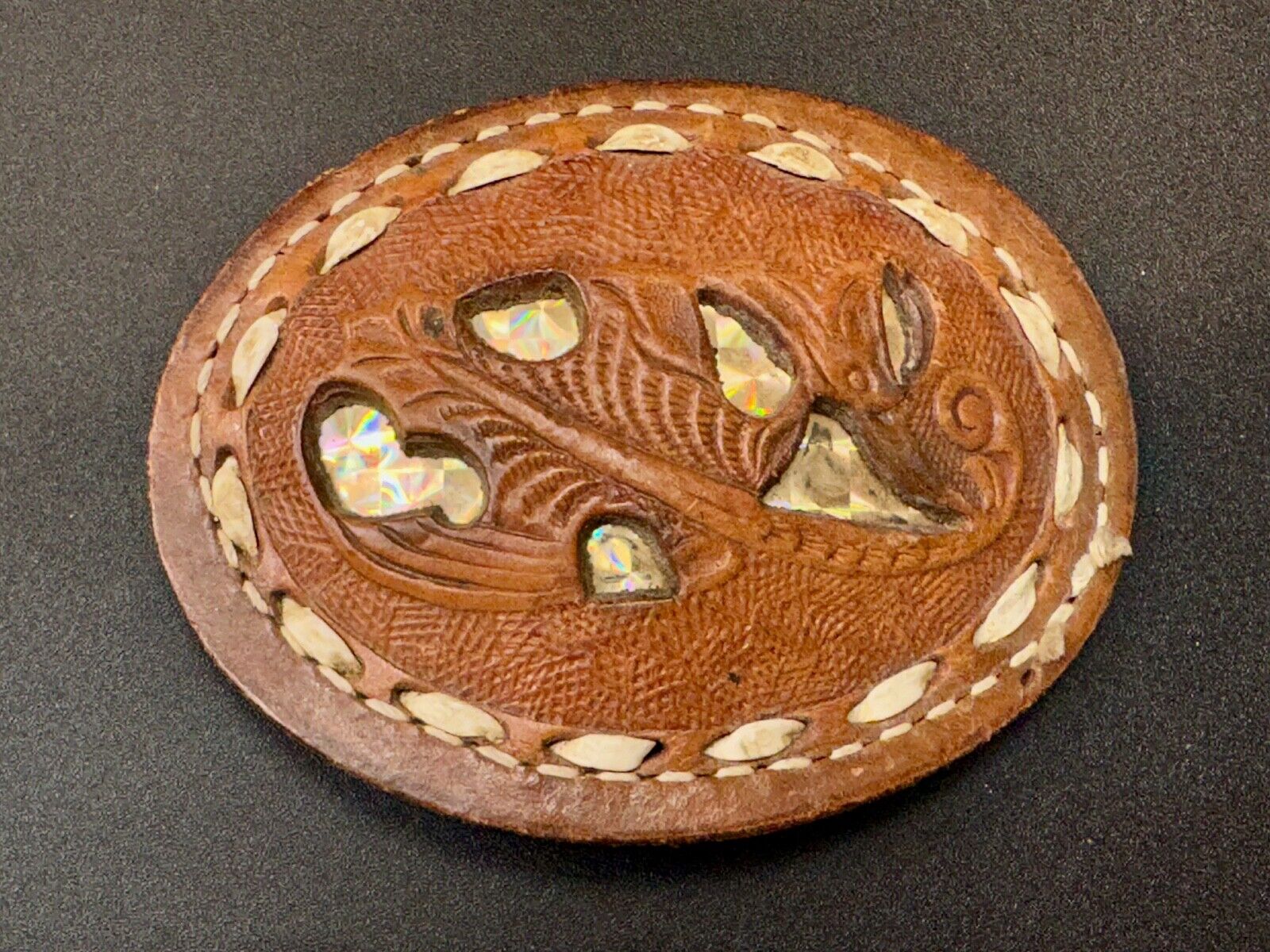 Unique leaf pattern in leather belt buckle made of Abalone shell