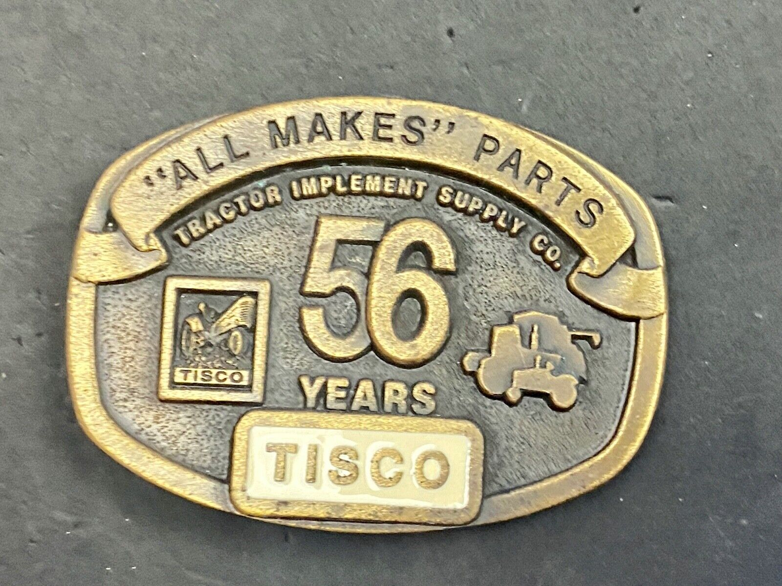 TISCO 56 Years ALL MAKES PARTS Tractor Service belt buckle Series 4 1993 
