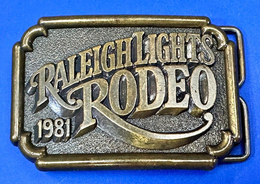 Vintage 1981 RALEIGH LIGHTS RODEO CIGARETTES SPONSOR Brass tone belt buckle