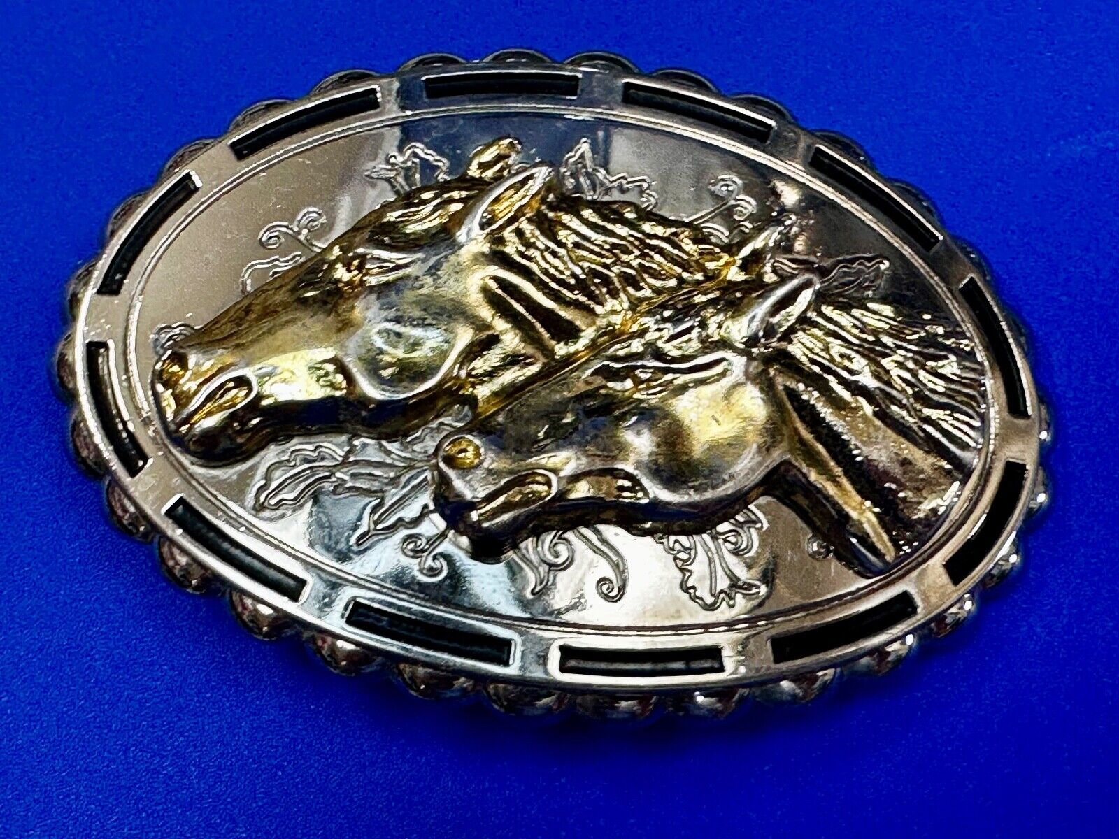 Two horse heads - Vintage two tone oval Belt Buckle with reflective backing