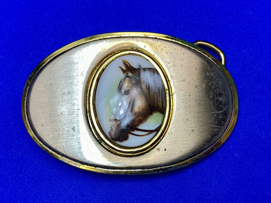 Vintage horse head picture centered in western belt buckle